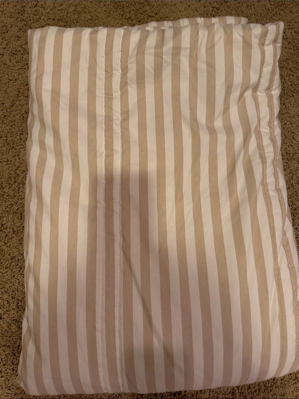 Tan and white striped comforter,  Twin